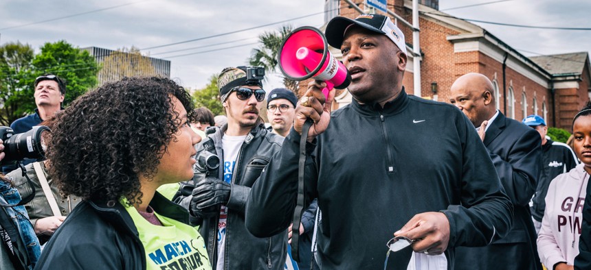 Columbia, S.C. Mayor Steve Benjamin speaks to a crowd of march participants before embarking on the "March for Our Lives" through downtown Columbia on March 24.