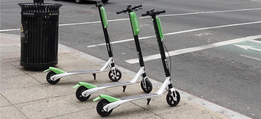 A Lime electronic scooter on L Street NW in Washington, D.C.