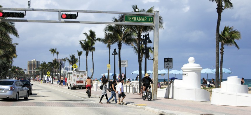 Pedestrians cross State Road A1A in Fort Lauderdale, Florida