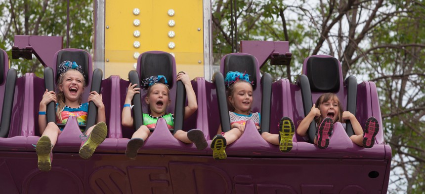 Children on a fair ride in Iowa.