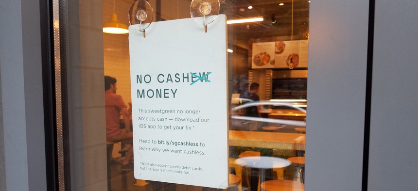 Sign in the window of a SweetGreen Restaurant in Washington, D.C.
