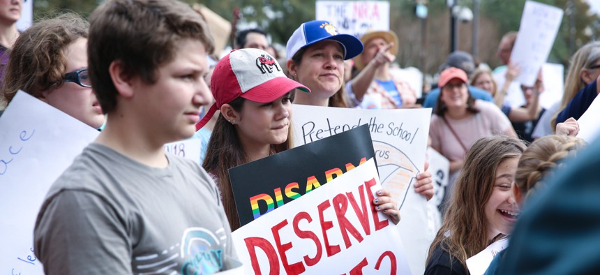 Tallahassee, Florida - February 21, 2018. A huge crowd participated at a "Never Again" rally to protest and change gun laws after the shooting at Marjory Stoneman Douglas High School.