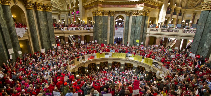 Wisconsin union protesters rally in February 2011 as legislation limiting unions is under consideration.