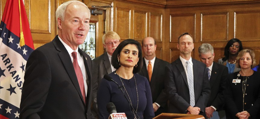 Gov. Asa Hutchinson speaks at a news conference Monday, March 5, 2018, at the state Capitol in Little Rock, Ark., with Seema Verma, the head of the Centers for Medicare and Medicaid Services about work requirements.