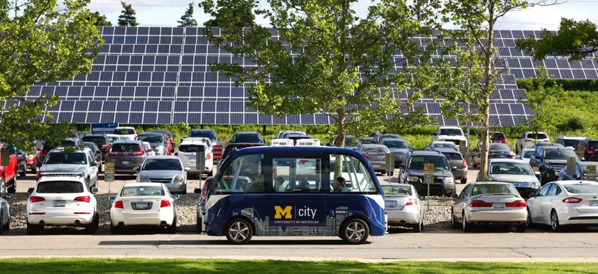  An Mcity driverless shuttle drives at the University of Michigan in Ann Arbor.