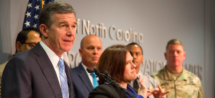 North Carolina Gov. Roy Cooper speaks during a press conference on Sunday.