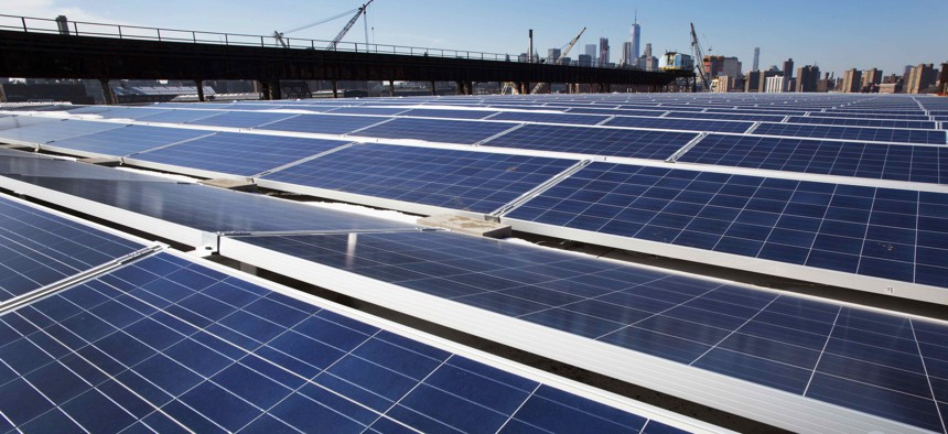 In this Feb. 14, 2017, file photo, a rooftop is covered with solar panels at the Brooklyn Navy Yard, Tuesday, Feb. 14, 2017, in New York. 