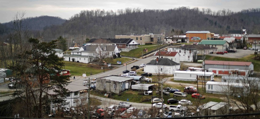 Main Street, center, cuts through Sandy Hook, Ky., a place badly battered by the collapse of the coal industry, Thursday, Dec. 14, 2017. 