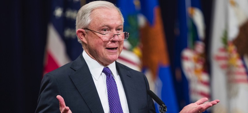 Attorney General Jeff Sessions announces new strategic actions to combat the opioid crisis at the Department of Justice's National Opioid Summit in Washington, D.C. on Thursday.