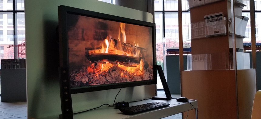 A virtual fireplace greets visitors in the lobby of the Port of Seattle headquarters on PIer 69.