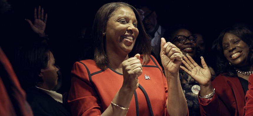 Democratic New York Attorney General-elect Letitia James, center, celebrates her victory during an election night party in the Brooklyn borough of New York, Tuesday, Nov. 6, 2018. 