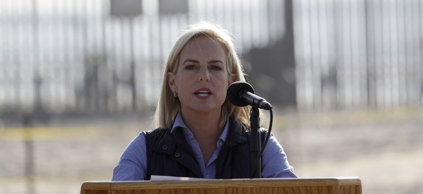Secretary of Homeland Security Kirstjen Nielsen speaks in front of the border wall separating Tijuana, Mexico, and San Diego, Tuesday, Nov. 20, 2018, in San Diego.