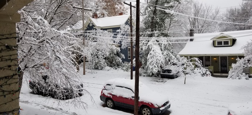Most of this snow in Raleigh's Boylan Heights neighborhood melted within a few hours on Sunday, but schools were closed on Monday and again on Tuesday. 