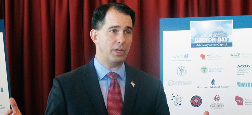 In this Jan. 30, 2018, file photo, Wisconsin Gov. Scott Walker speaks at a news conference in Madison, Wis.
