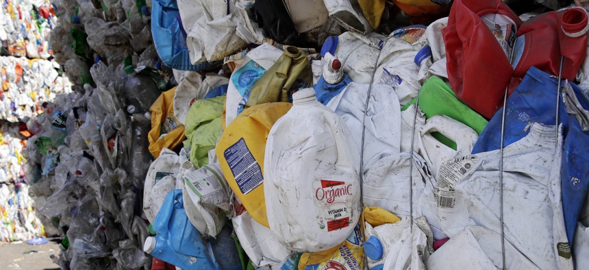 Recycling piles up at a facility in Westborough, Massachusetts. Many small towns have had to limit their programs in response to changes in the recycling market.