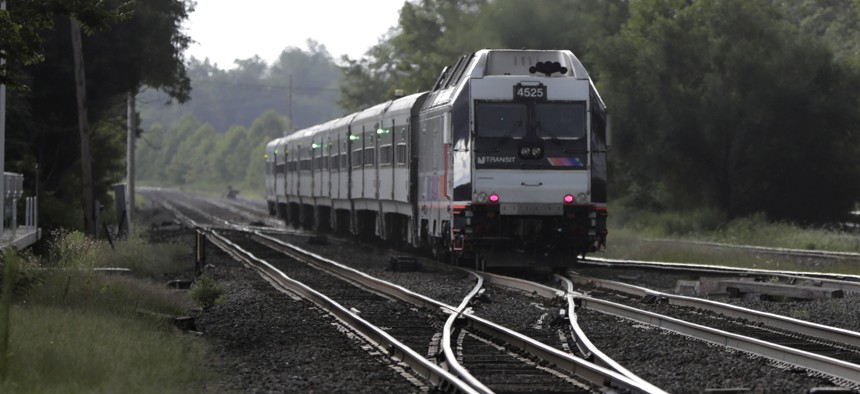 This Aug. 3, 2018 file photo shows a New Jersey Transit train leaving the Bound Brook Station in Bound Brook, N.J. 
