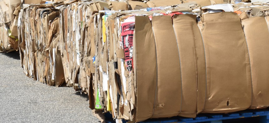 Large bundles of compressed cardboard await pickup in Greenville, South Carolina in April 2018. 