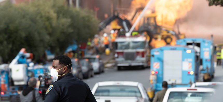 Firefighters battle a gas main blaze on Geary Blvd. in San Francisco's Richmond District in February. 