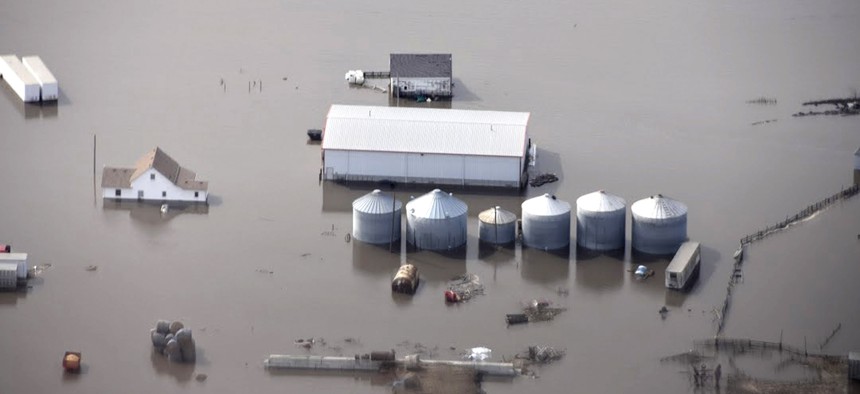 This Monday, March 18, 2019 photo taken by the South Dakota Civil Air Patrol and provided by the Iowa Department of Homeland Security and Emergency Management, shows flooding along the Missouri River in rural Iowa north of Omaha, Neb.