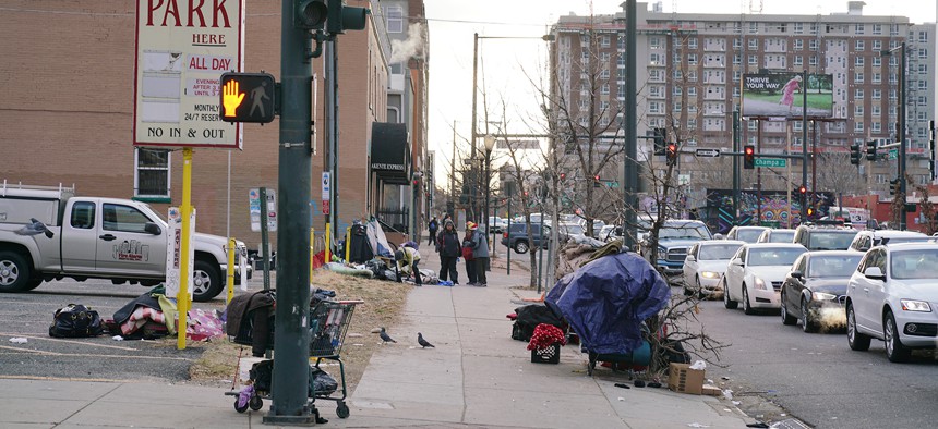 People experiencing homelessness tend to live in certain pockets of Denver’s downtown, including this section of Champa Street. This is also an area where people experiencing homelessness frequently encounter police.