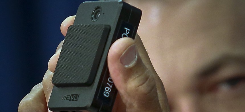 A newly issued police body camera is shown during a 2018 NYPD news conference in New York. 