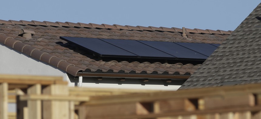 Solar panels are seen on the rooftop on a new home in Sacramento. California is the first state in the nation to require homes built in 2020 and later be solar powered. 