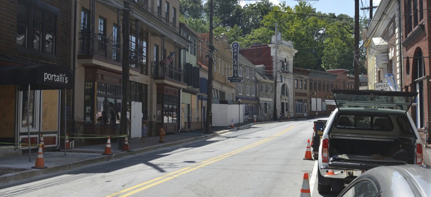 At least four buildings at the foot of Ellicott City's Main Street would be demolished to build a flood mitigation system. 