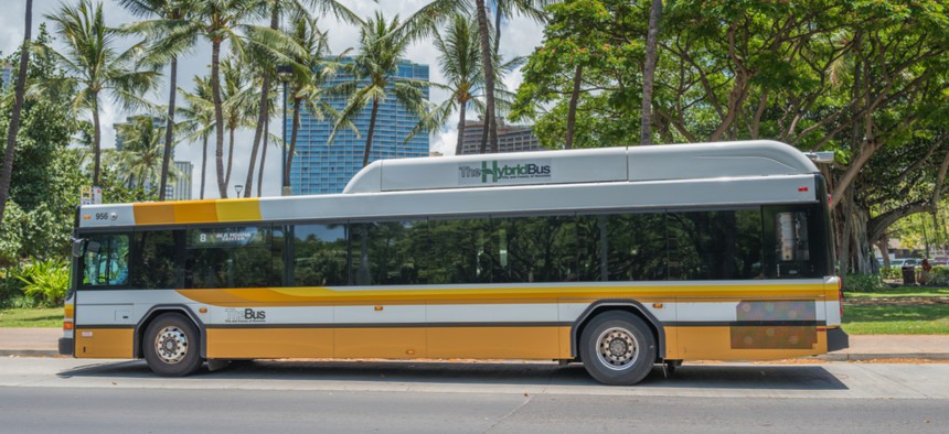 A hybrid bus on Hawaii's street.