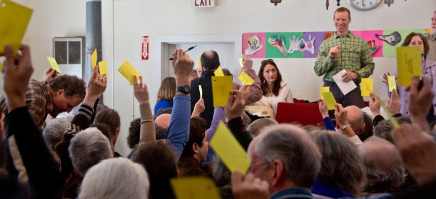 Residents vote in a town hall meeting in Calais, Vermont.