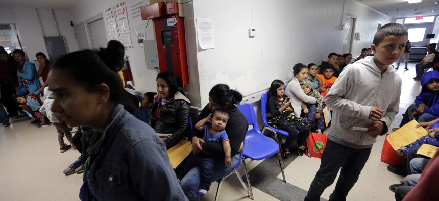 Migrant families at the Catholic Charities respite center in McAllen, Texas. 