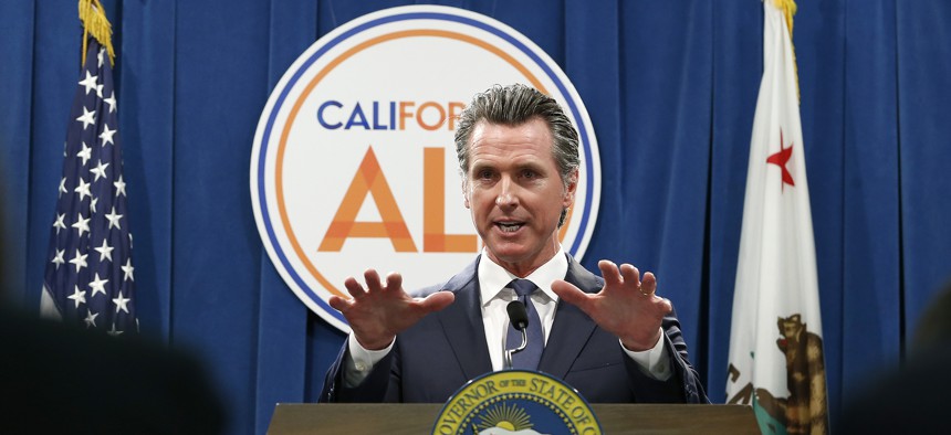 Gov. Newsom discusses his budget with lawmakers on May 9, 2019.