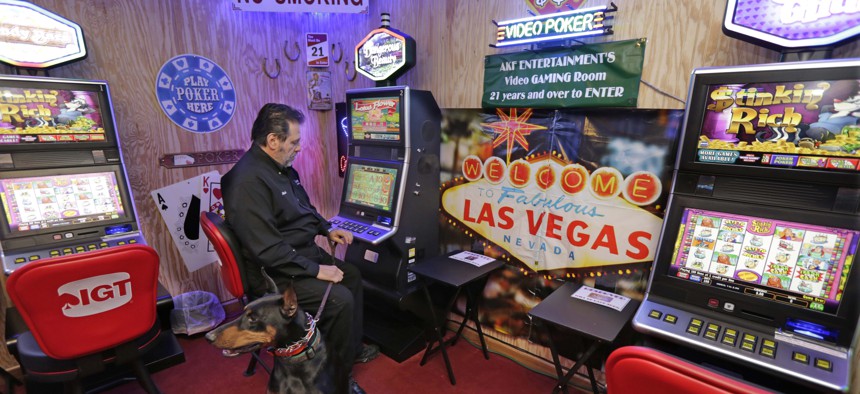 Michael Vena, owner of Arabian Knights Farms and Training Center, shows off the farm's gaming room in Willowbrook, Illinois.