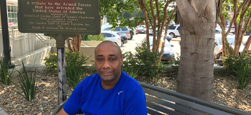 Retired Army veteran Everett Brockington sits outside the Ralph H. Johnson VA Medical Center in Charleston, South Carolina. He says most veterans he knows who are struggling with suicidal thoughts are not receiving mental health care.