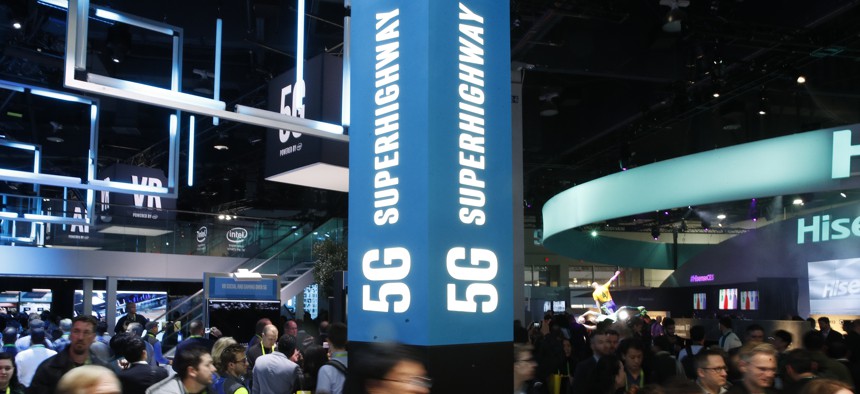 A sign advertises 5G devices at the Intel booth during CES International, Tuesday, Jan. 9, 2018, in Las Vegas. 