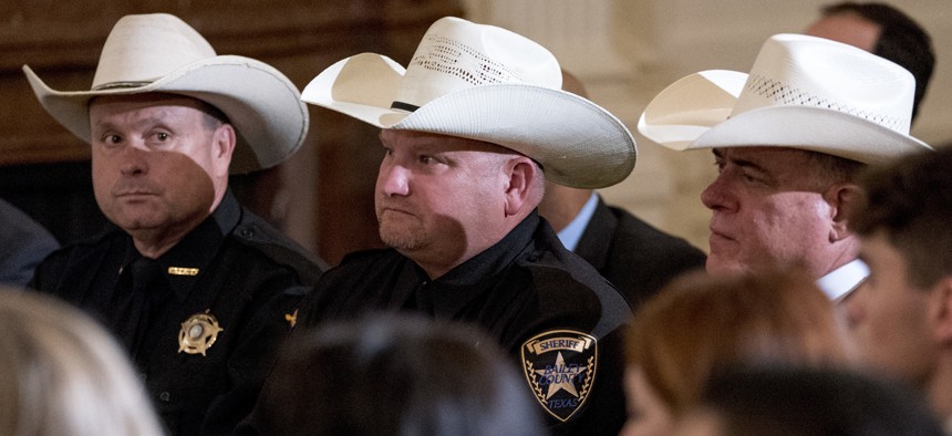 Sheriffs attend an event to salute U.S. Immigration and Customs Enforcement (ICE) officers at the White House in 2018.