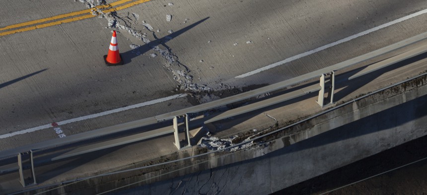Damage to the Pfeiffer Canyon Bridge on Highway is seen from a helicopter on Monday, March 13, 2017, in Big Sur, Calif. 