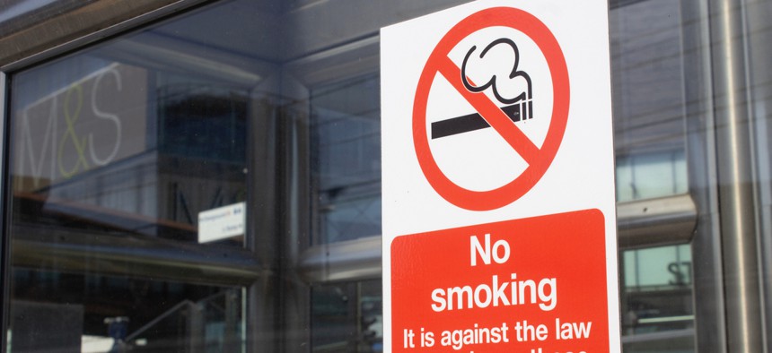 Some local governments are going beyond smoke-free workplaces to "smoker-free" workplaces.