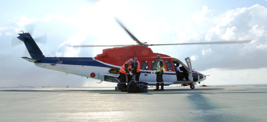 An air ambulance loads before take off.