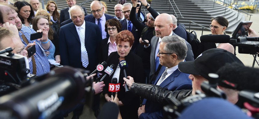 Summit county executive Ilene Shapiro speaks to the media outside the U.S. Federal courthouse, Monday, Oct. 21, 2019, in Cleveland about a $260 million settlement agreement with drug companies. 