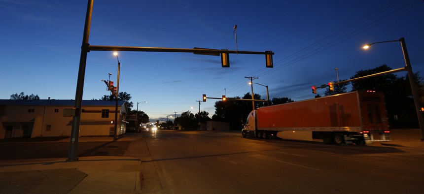 In this photo taken Oct. 16, 2014, dusk descends over the small rural town of Yuma, eastern Colorado. This farming hamlet of 3,200 near the Nebraska border is home to an increasing number of Latino immigrants.