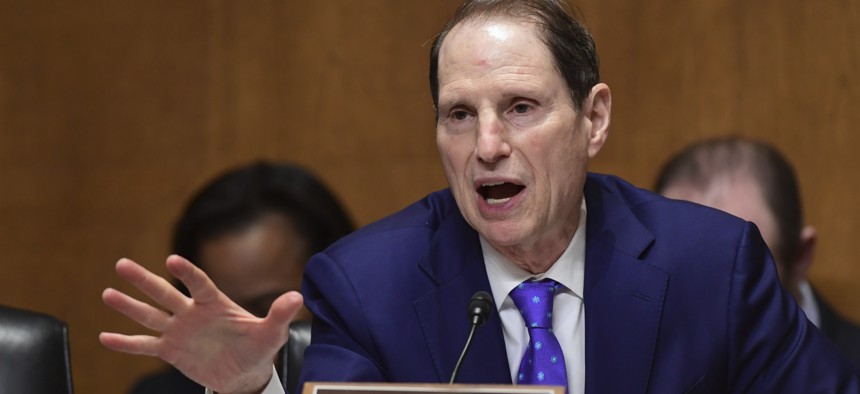 Sen. Ron Wyden, D-Ore., seen here questioning Treasury Secretary Steven Mnuchin during 2018, is among the Democrats with concerns about the Opportunity Zones program.