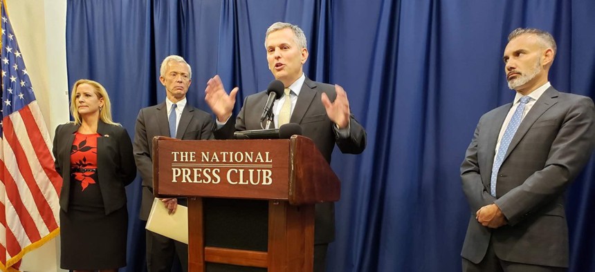 North Carolina Attorney General Josh Stein appears at a press conference in Washington, D.C., in August to announce an agreement among a group of attorneys general with major telecom companies in an effort to block robocall scams. 