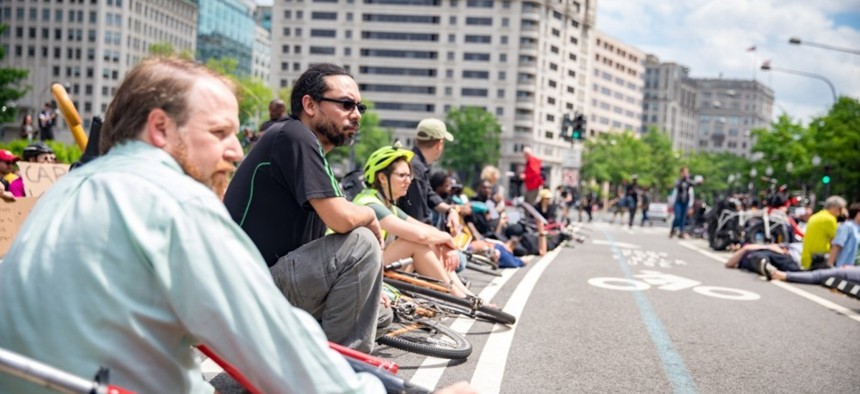 Bike and pedestrian advocates participate in a "die-in" for better traffic safety in Washington, D.C. 