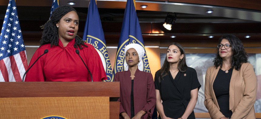 Rep. Ayanna Pressley speaks at a press conference with the other members of "The Squad," Reps. Ilhan Omar, Alexandria Ocasio-Cortez, Rashida Tlaib. 