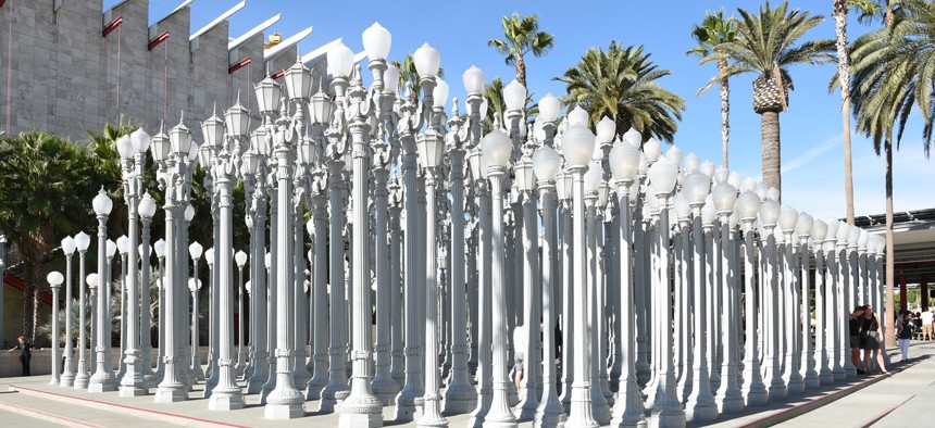 Chris Burden's "Urban Light," installed at the Los Angeles Contemporary Museum of Art, features several of L.A.'s historic streetlight styles.