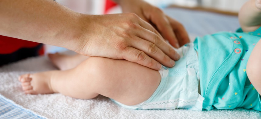 Diaper changing stations are required by law in men's and women's restrooms in federal government buildings and at least four states.