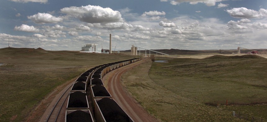A pair of coal trains idle near Gillette, Wyo. in 2010. Slack demand for coal in the U.S. in recent years has caused mines to look abroad for potential customers.
