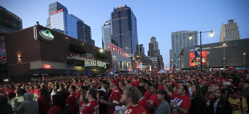 Kansas City Chiefs fans watch the Super Bowl at the Power and Light District in Kansas City, Mo., Sunday, Feb. 2, 2020.