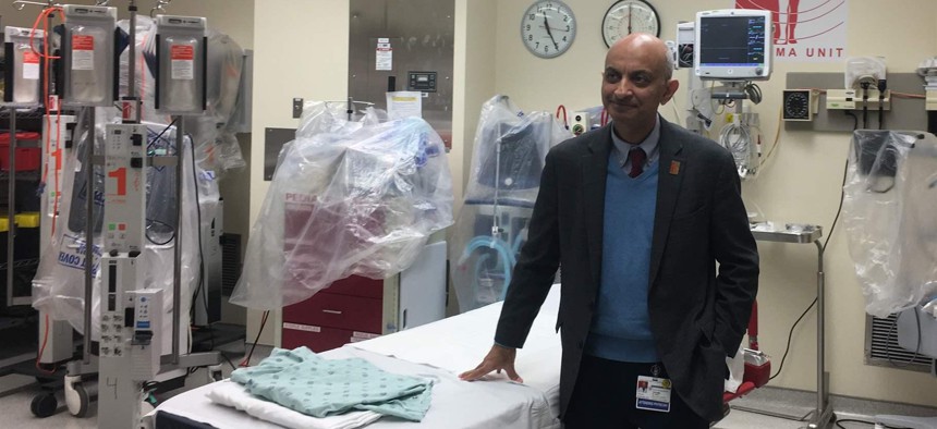 Faran Bokhari said too much of the burden for caring for non-paying patients falls on safety net hospitals like Cook County Health’s John H. Stroger Hospital in Chicago, where he chairs the trauma department.