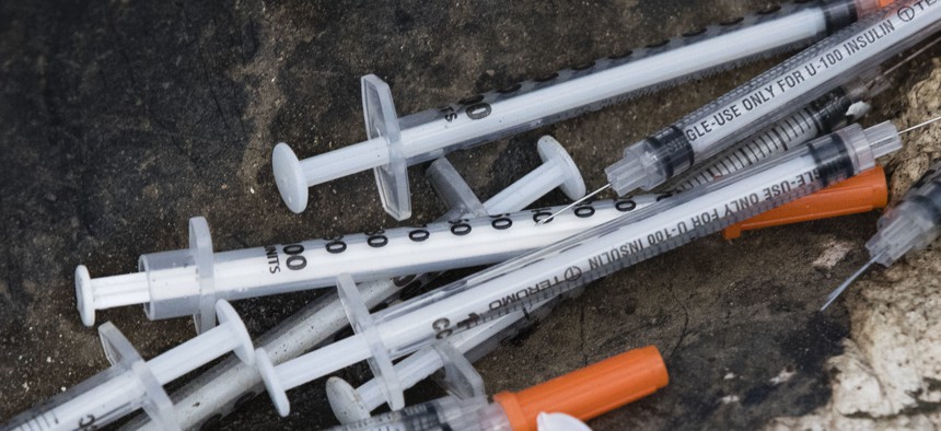 A pile of discarded syringes in an open-air heroin market in Philadelphia.